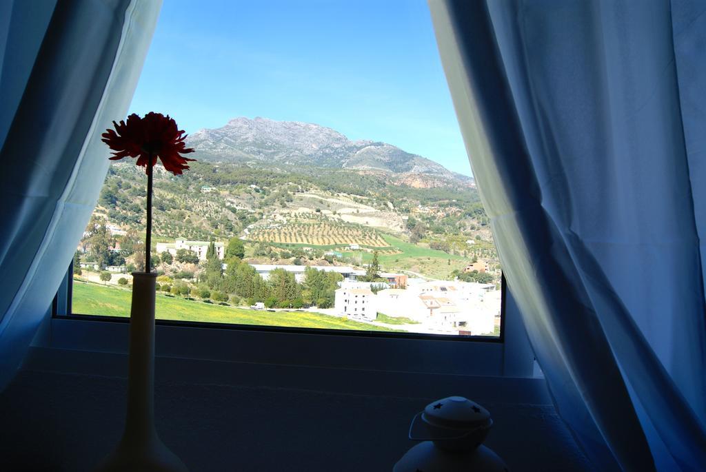 Hostal Sango Sierra De Las Nieves Alozaina Exterior photo